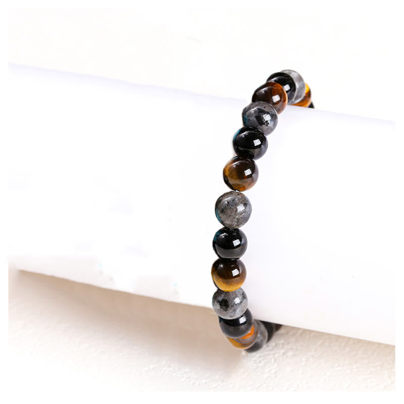 Pulsera de protección con piedras de Buda, ojo de tigre, piedra brillante negra, cuentas de vidrio negro, obsidiana copo de nieve, roca de lava y rodonita.