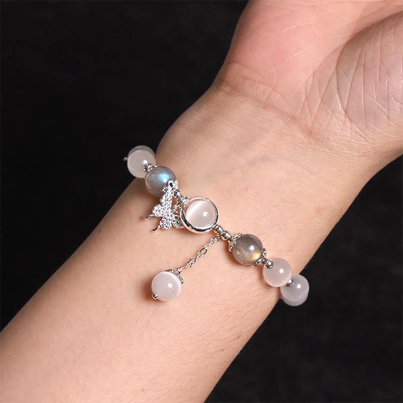 Pulsera de soporte con dije de estrella y mariposa con piedra lunar y ojo de gato de Buddha Stones