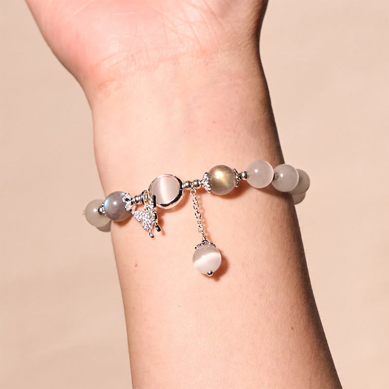 Pulsera de soporte con dije de estrella y mariposa con piedra lunar y ojo de gato de Buddha Stones