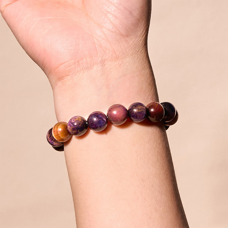 Pulsera de protección y fuerza con ojo de tigre morado natural de Buddha Stones