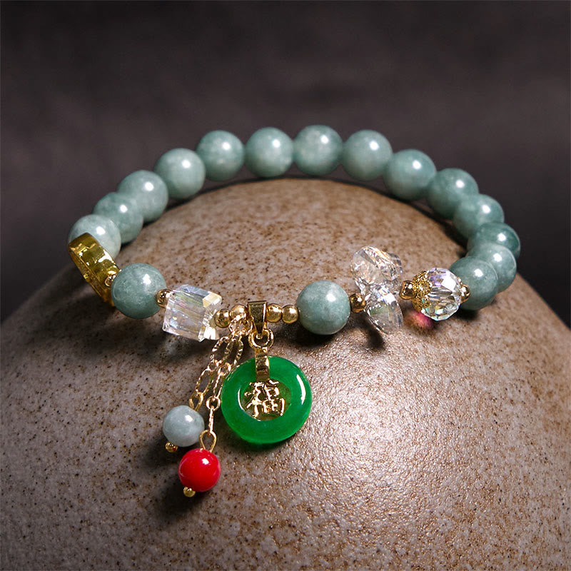 Pulsera curativa con dijes de jade fu y cuarzo fresa de Buda