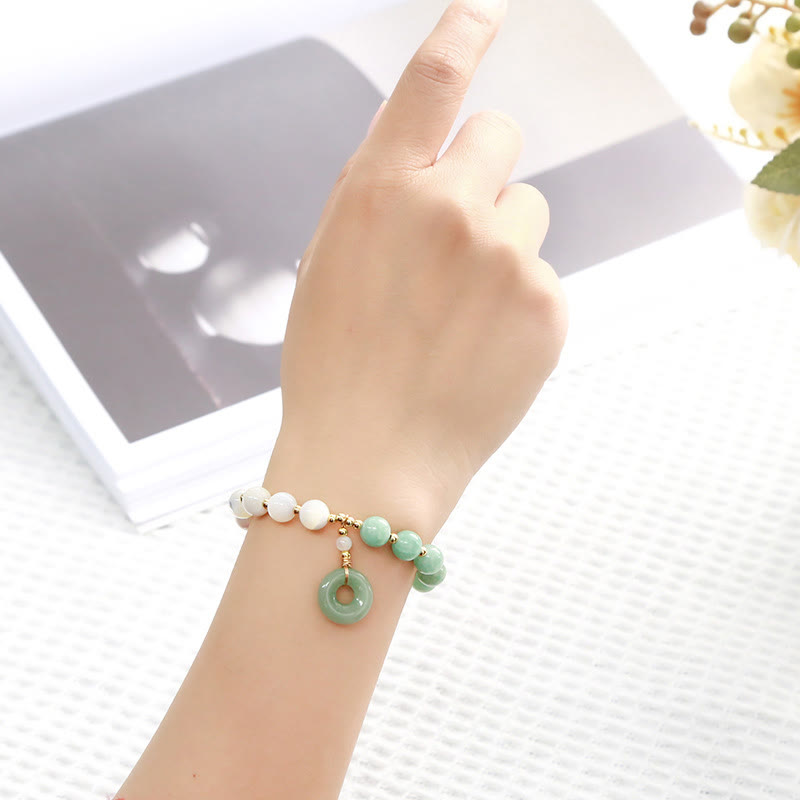 Pulsera de la abundancia con dije de hebilla de paz, caracol, herradura y jade de Buda