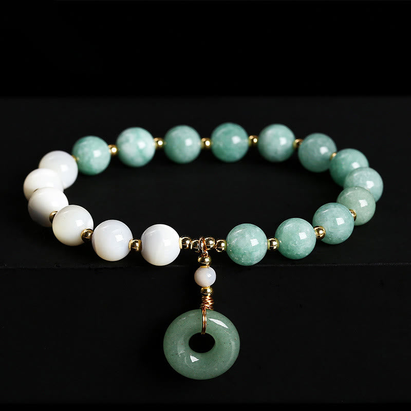 Pulsera de la abundancia con dije de hebilla de paz, caracol, herradura y jade de Buda