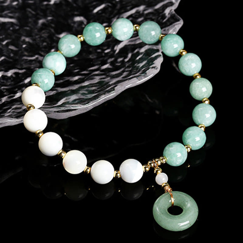 Pulsera de la abundancia con dije de hebilla de paz, caracol, herradura y jade de Buda