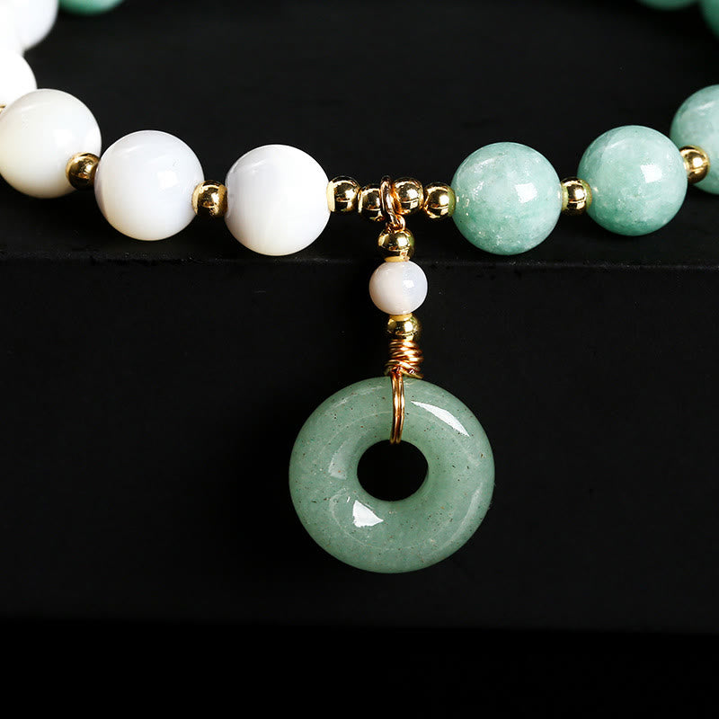 Pulsera de la abundancia con dije de hebilla de paz, caracol, herradura y jade de Buda