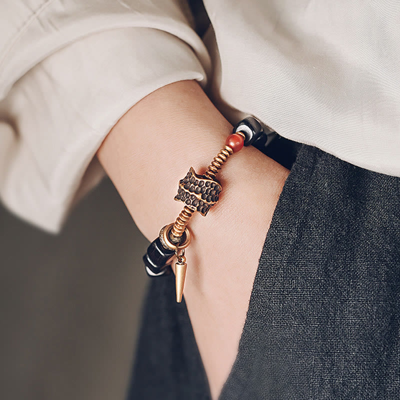 Pulsera de la paz con piedras de Buda, madera de ébano, cobre, latón y ágata roja