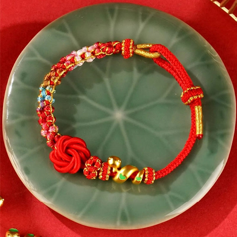 Pulsera trenzada con nudo de mandala de hilo rojo y piedras de Buda, tejida a mano con flores de colores, protección del Año de la Serpiente