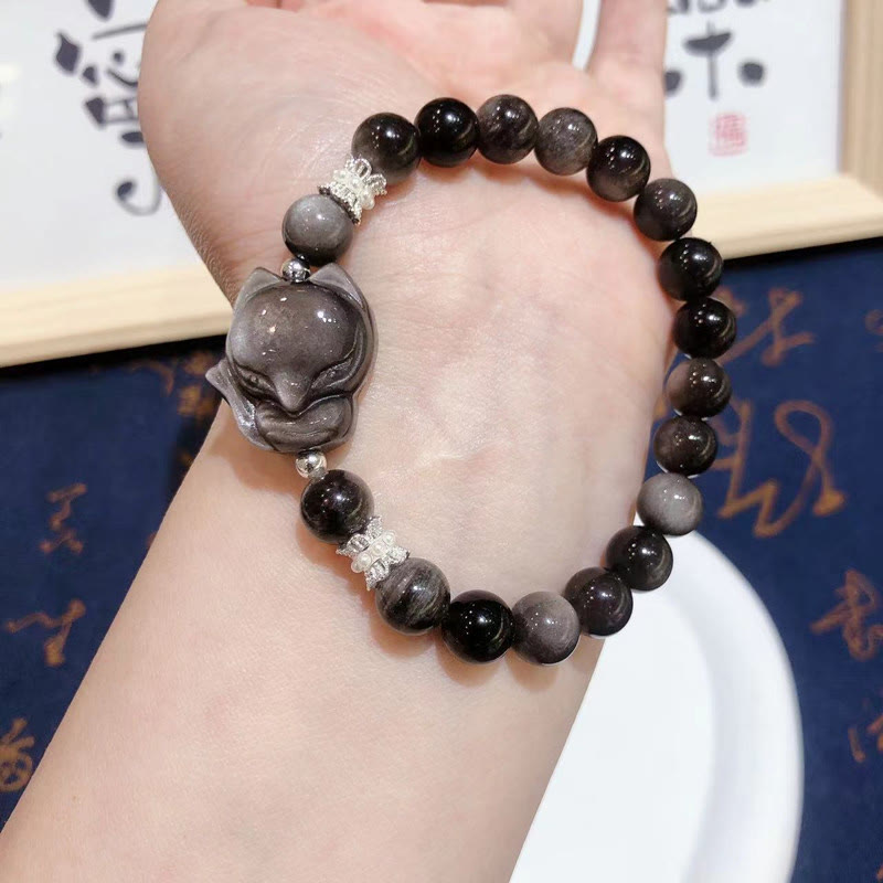 Pulsera de comunicación de zorro de nueve colas de obsidiana con brillo plateado natural de Buddha Stones