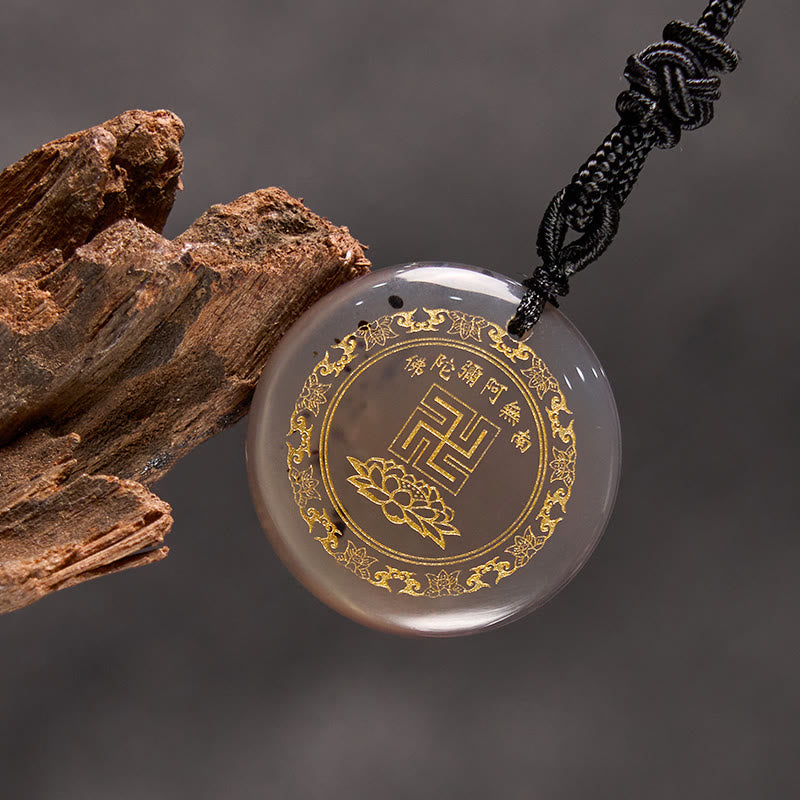 Collar con colgante de obsidiana negra con cristales naturales y varios diseños de loto y esvástica de Buda.