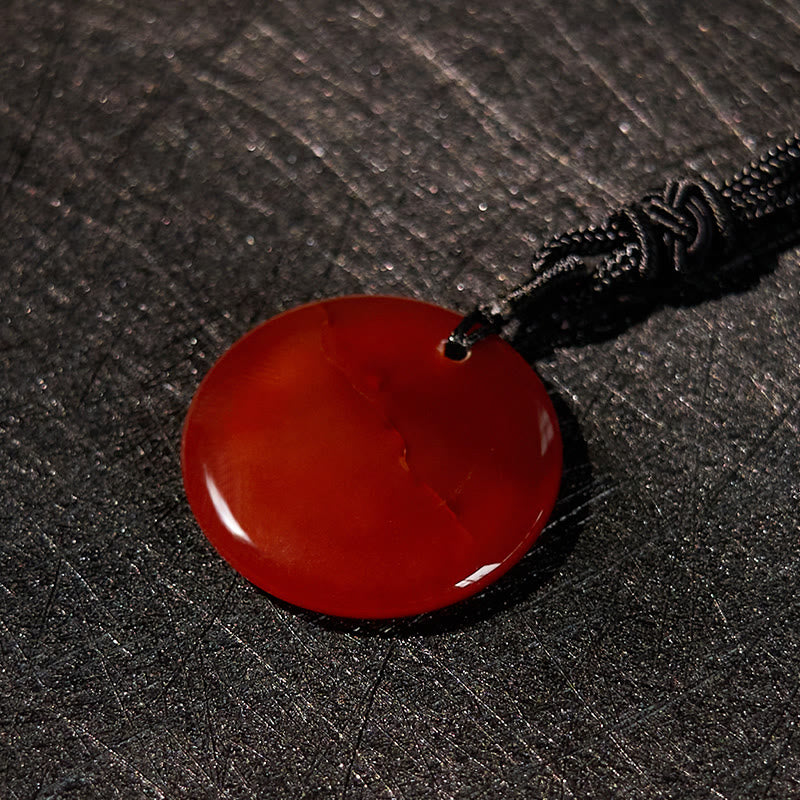 Collar con colgante de obsidiana negra con cristales naturales y varios diseños de loto y esvástica de Buda.