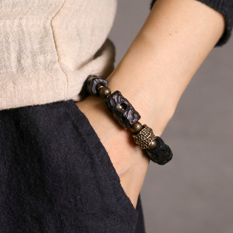 Pulsera de piedra de Buda, madera de ébano, cobre y latón para calmar