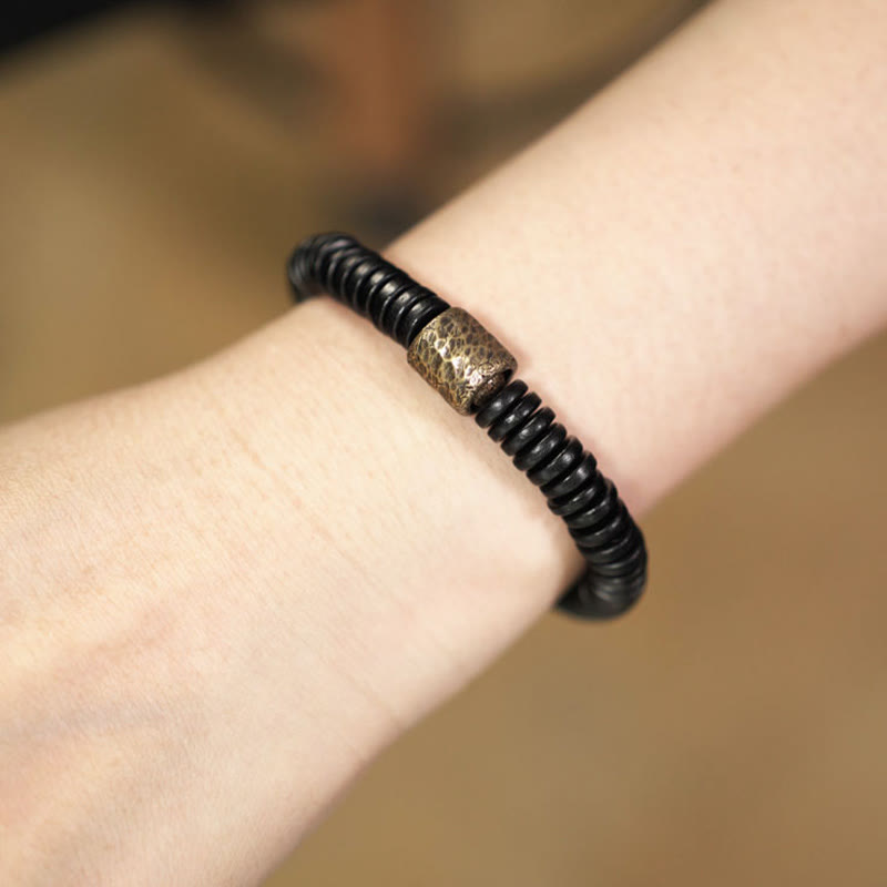 Pulsera de piedra de Buda, madera de ébano, cobre y latón para calmar