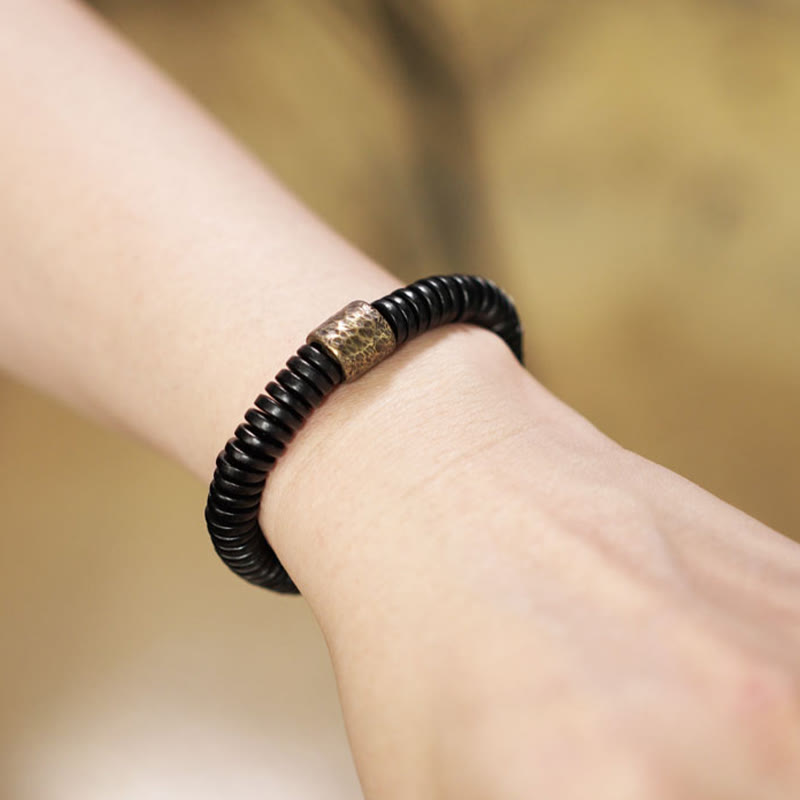 Pulsera de piedra de Buda, madera de ébano, cobre y latón para calmar