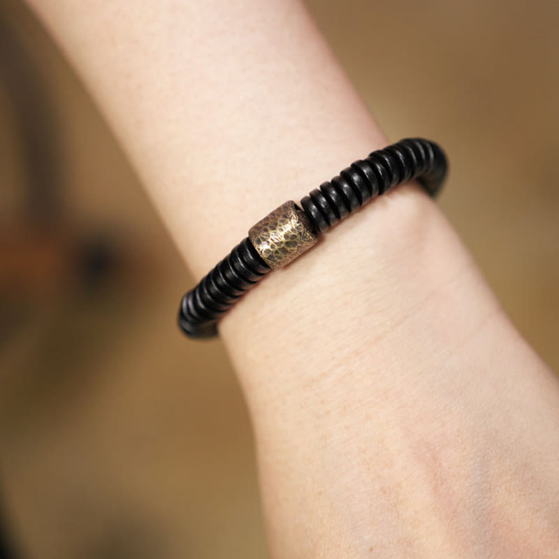 Pulsera de piedra de Buda, madera de ébano, cobre y latón para calmar
