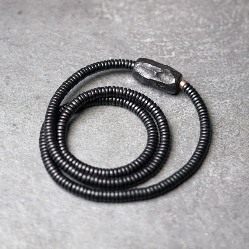 Pulsera de triple vuelta con piedras de Buda, madera de ébano, cobre y latón