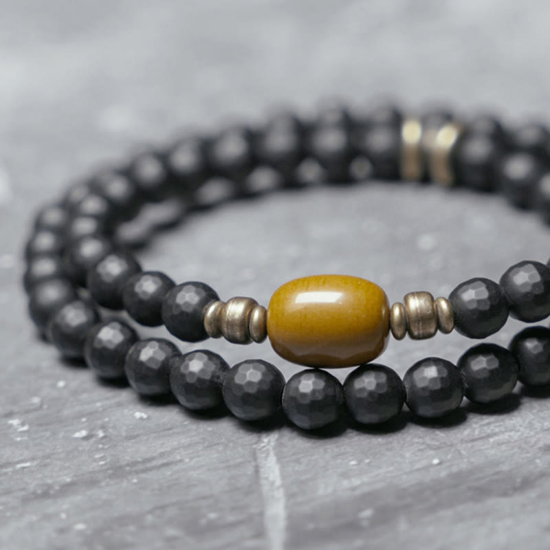 Pulsera protectora de doble vuelta con cuentas de topacio ónix negro y superficie esmerilada de Buda