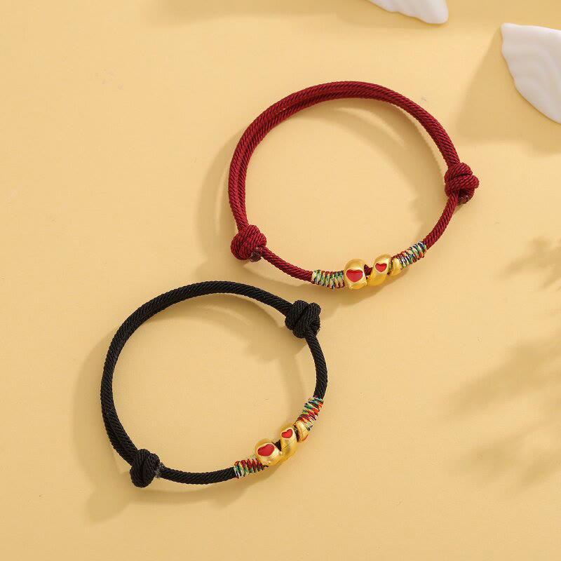 Pulsera trenzada de aleación de cobre con hilo rojo y piedras de Buda para proteger el Año de la Serpiente