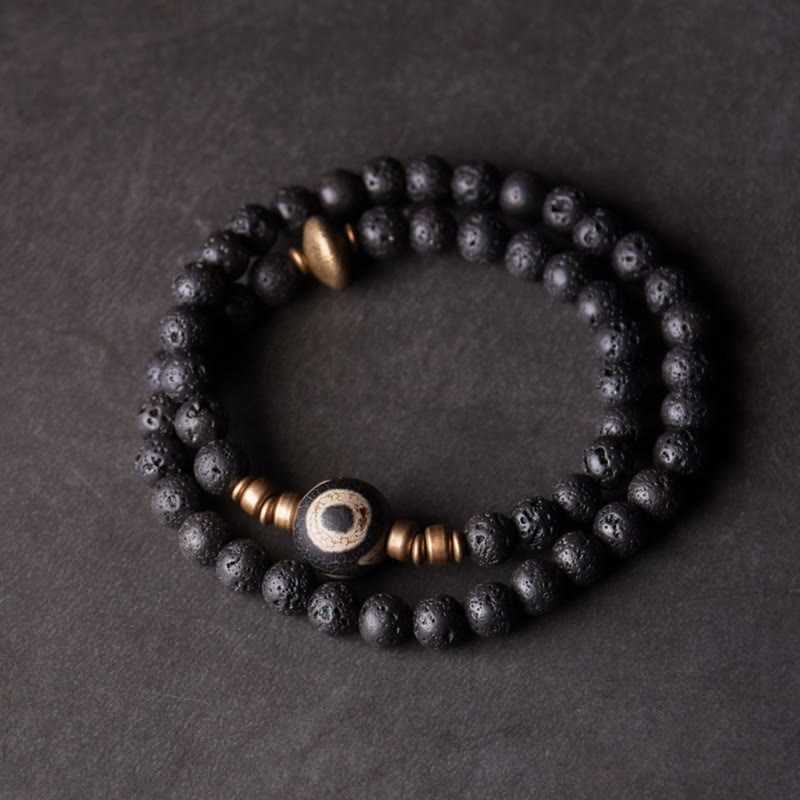 Pulsera curativa de doble vuelta con cuentas de latón y cobre de tres ojos de roca de lava vintage de Buda