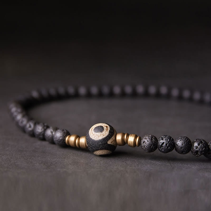 Pulsera curativa de doble vuelta con cuentas de latón y cobre de tres ojos de roca de lava vintage de Buda
