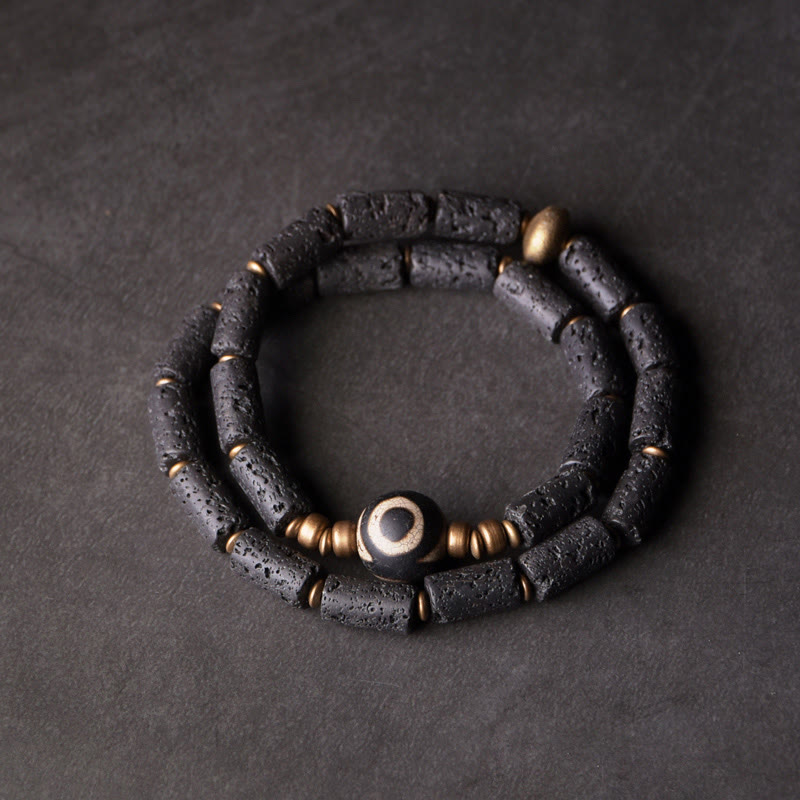 Pulsera de calma con múltiples vueltas de cobre y latón con cuentas Dzi de tres ojos de roca volcánica vintage de Buda