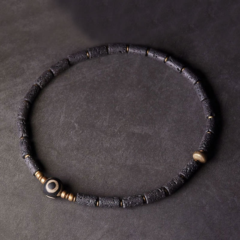 Pulsera de calma con múltiples vueltas de cobre y latón con cuentas Dzi de tres ojos de roca volcánica vintage de Buda