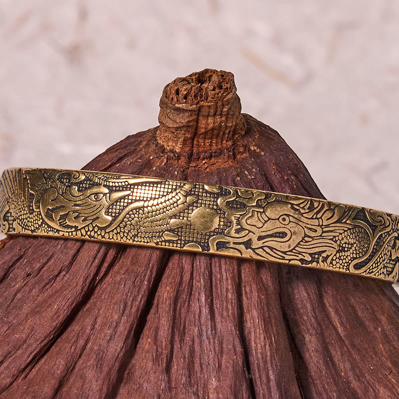 Pulsera de protección de la suerte de cobre y latón tallada con piedras de Buda, dragón y fénix jugando con una perla