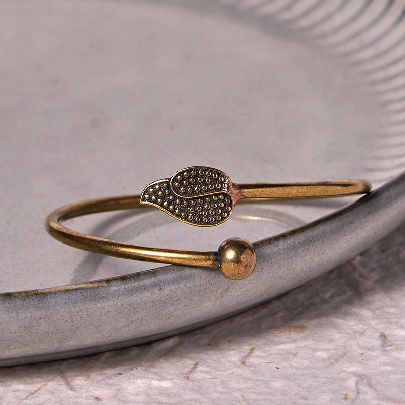 Pulsera brazalete de cobre y latón con cuentas de hojas y piedras de Buda para la suerte y la riqueza