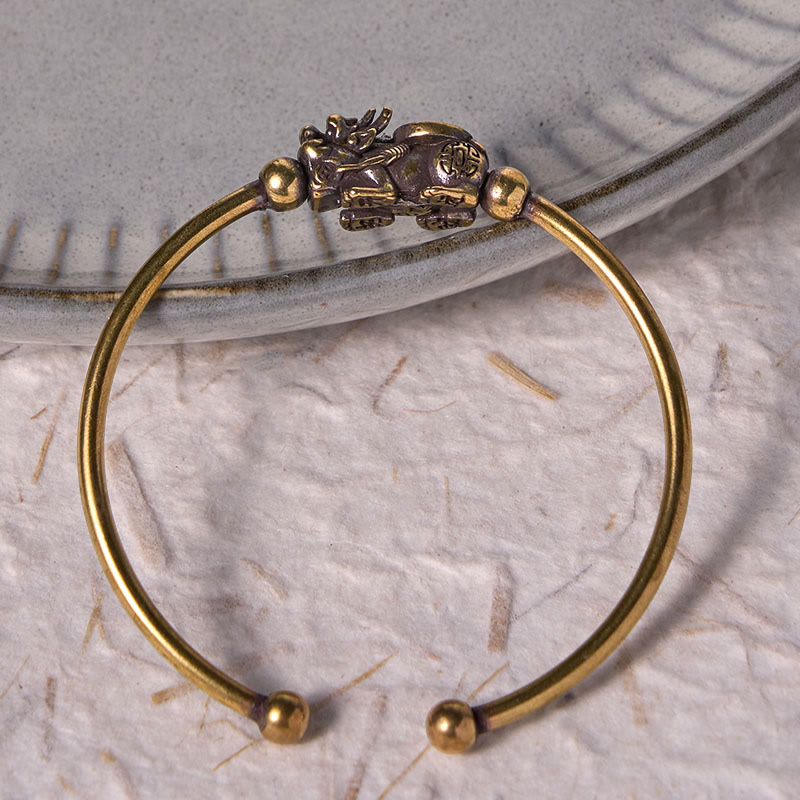 Pulsera de cobre y latón con piedras de Buda Pi Xiu y brújula, símbolo de la suerte y la riqueza.