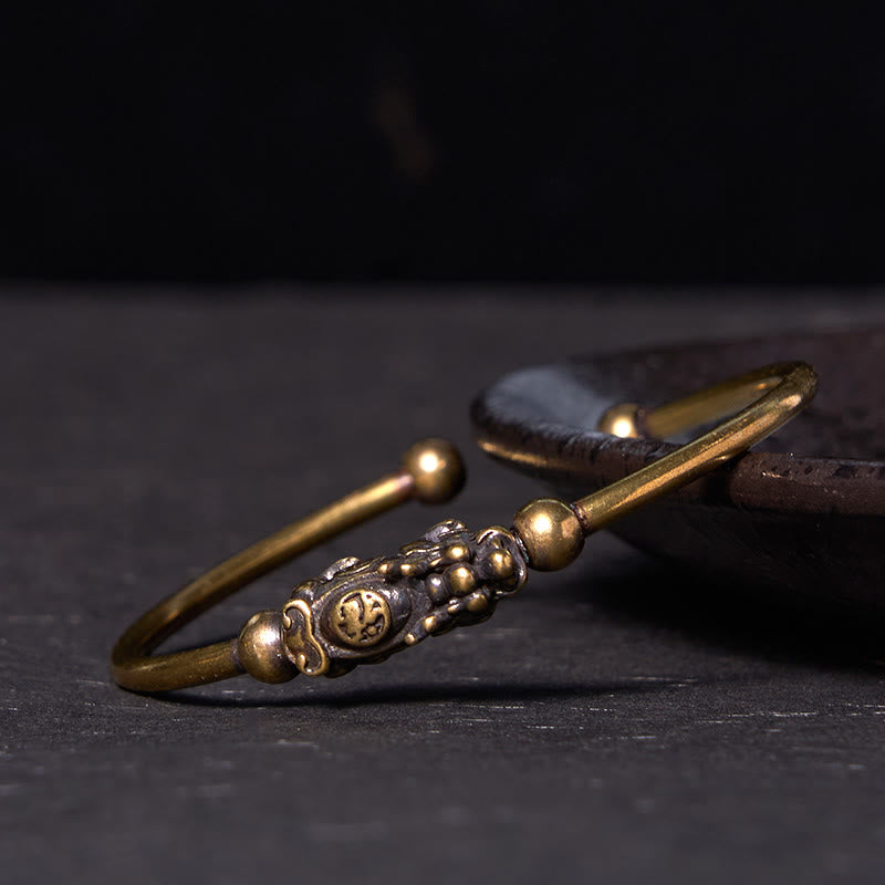 Pulsera de cobre y latón con piedras de Buda Pi Xiu y brújula, símbolo de la suerte y la riqueza.