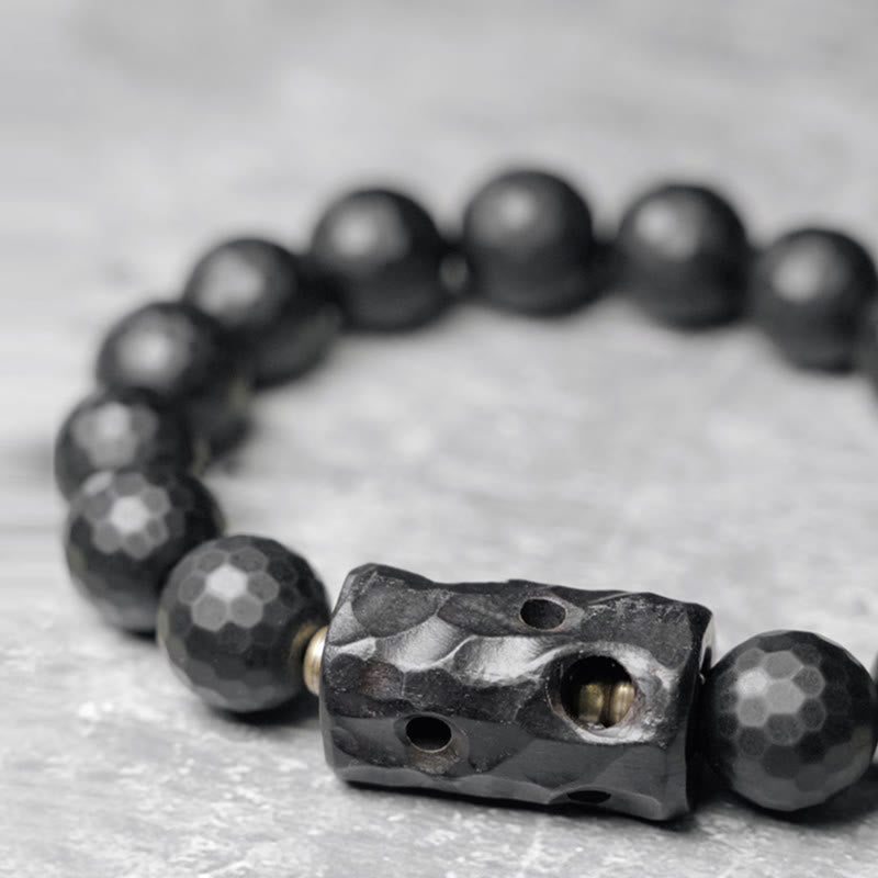 Pulsera protectora de ébano y ónix negro con superficie mate esmerilada de Buddha Stones
