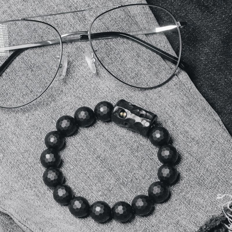 Pulsera protectora de ébano y ónix negro con superficie mate esmerilada de Buddha Stones