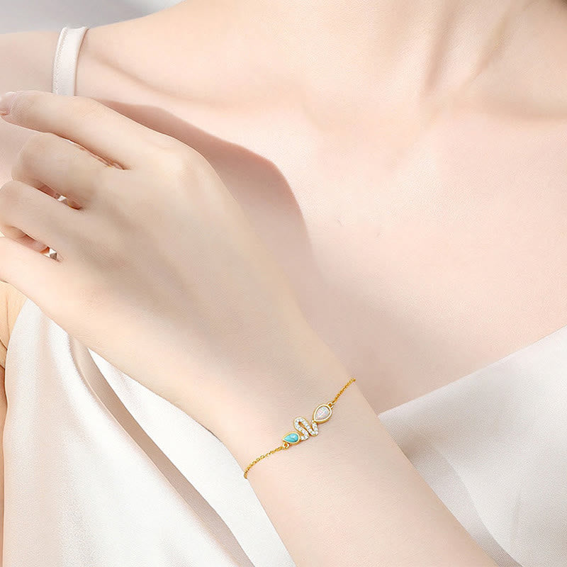 Pulsera de protección del Año de la Serpiente con ópalo turquesa y piedras de Buda en plata de ley 925