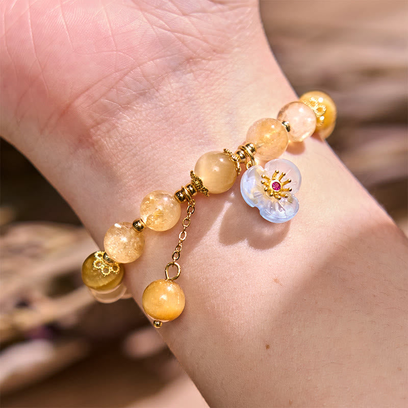 Pulsera de generosidad con citrino, ojo de tigre y flor de Buda
