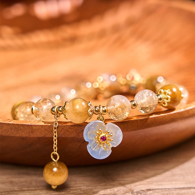 Pulsera de generosidad con citrino, ojo de tigre y flor de Buda