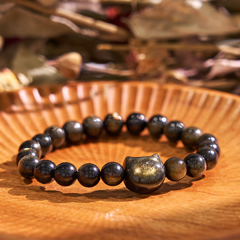 Pulsera de protección con piedras de Buda, obsidiana dorada y obsidiana plateada con brillo, con forma de pata de gato de la suerte.