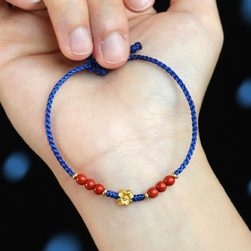 Pulsera Buddha Stones Klein con hilo azul, ágata roja del sur, granate y cobre Flower Power