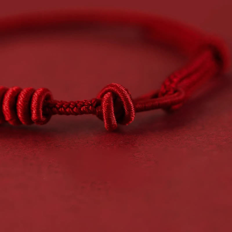 Pulsera de cuerda de ocho hilos con piedras de Buda y hilo rojo