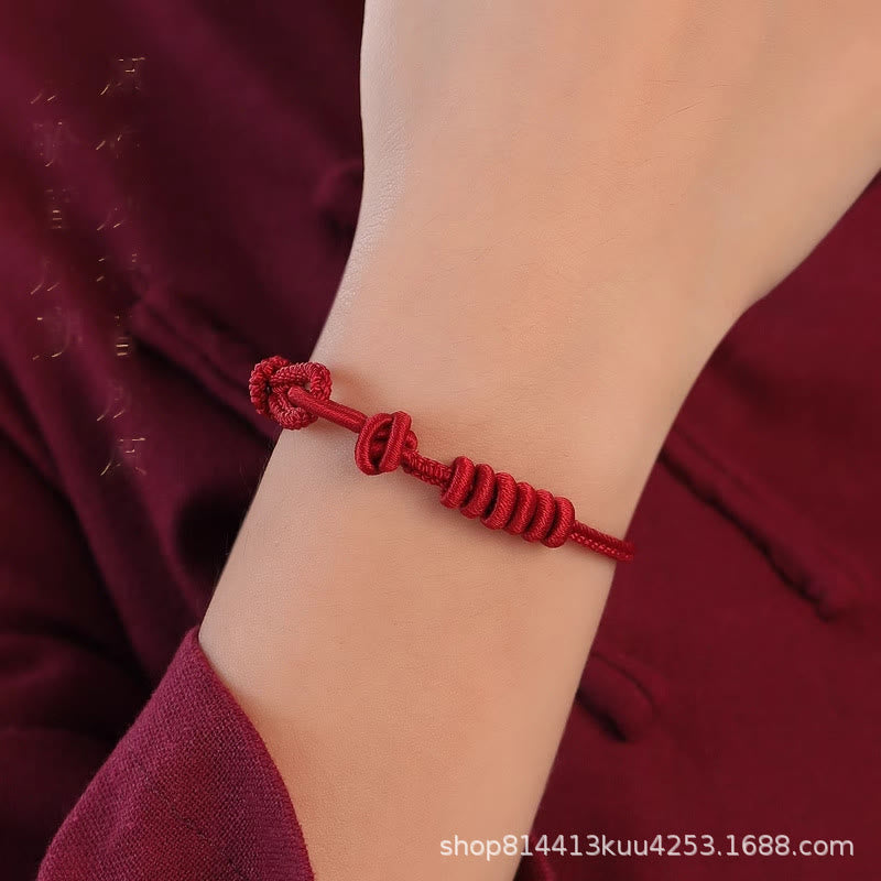 Pulsera de cuerda de ocho hilos con piedras de Buda y hilo rojo