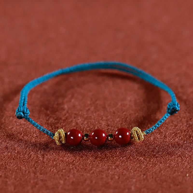 Pulsera de cinabrio con piedras de Buda y cordón colorido para la calma