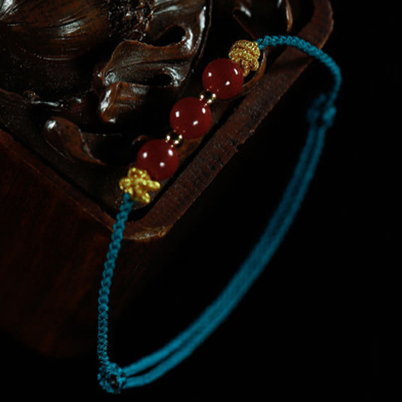 Pulsera de cinabrio con piedras de Buda y cordón colorido para la calma