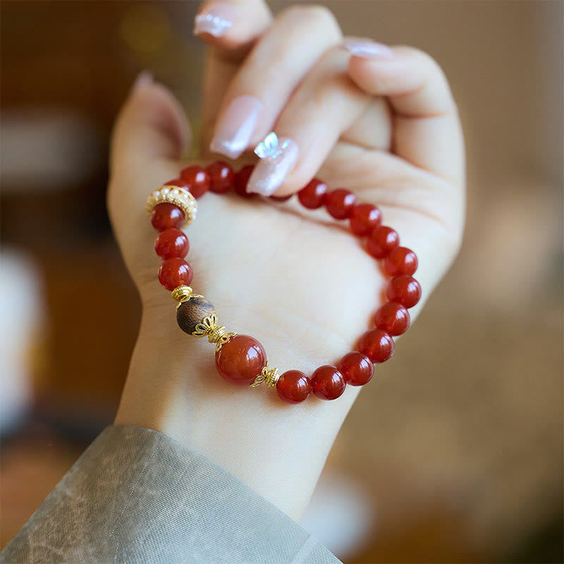 Pulsera de confianza de ágata roja y madera de agar con piedras de Buda