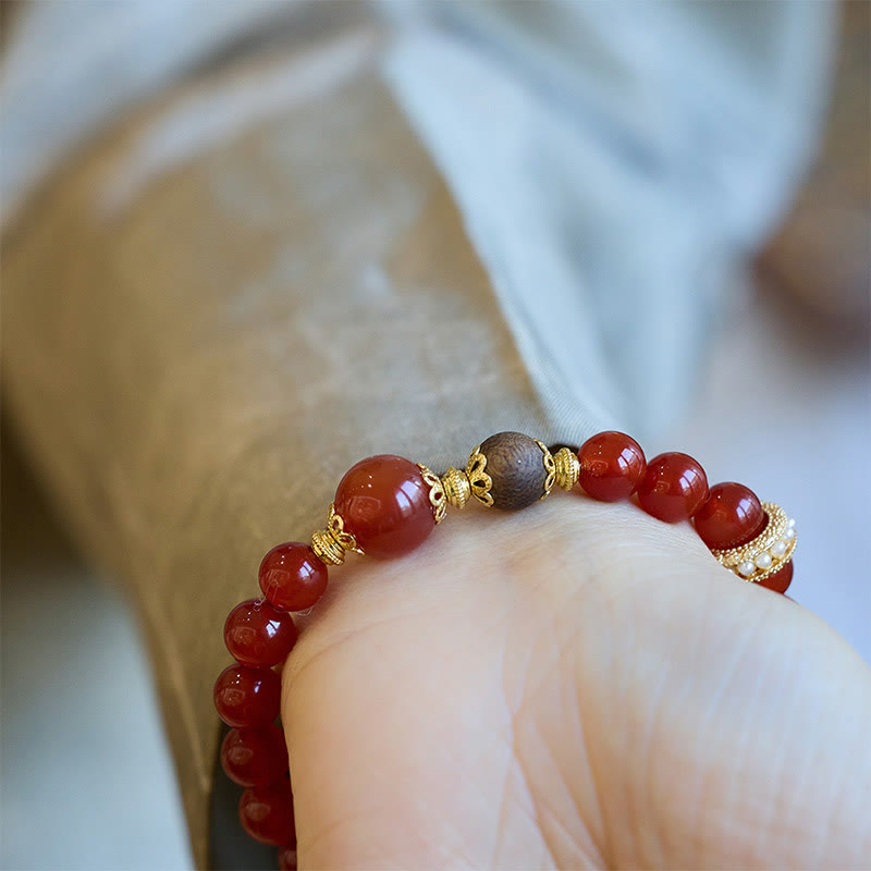 Pulsera de confianza de ágata roja y madera de agar con piedras de Buda