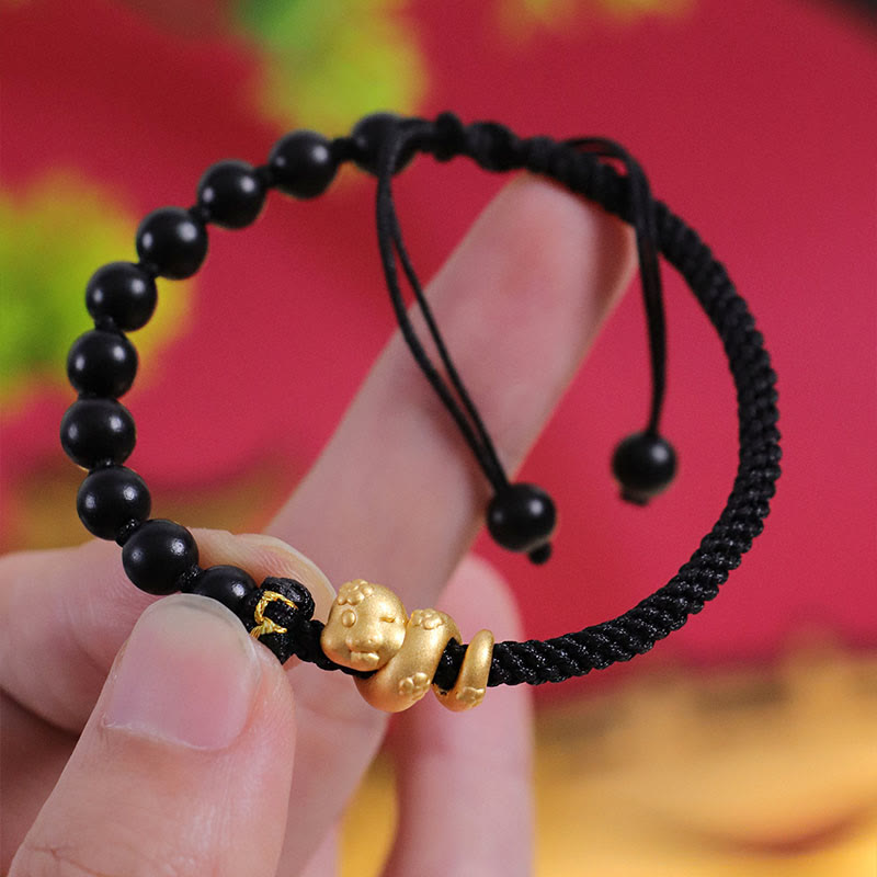 Pulsera trenzada de cuerda de algodón con cuentas de madera de ébano y sándalo rojo de hoja pequeña de Buda, año de la serpiente 999.
