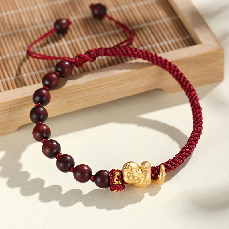 Pulsera trenzada de cuerda de algodón con cuentas de madera de ébano y sándalo rojo de hoja pequeña de Buda, año de la serpiente 999.