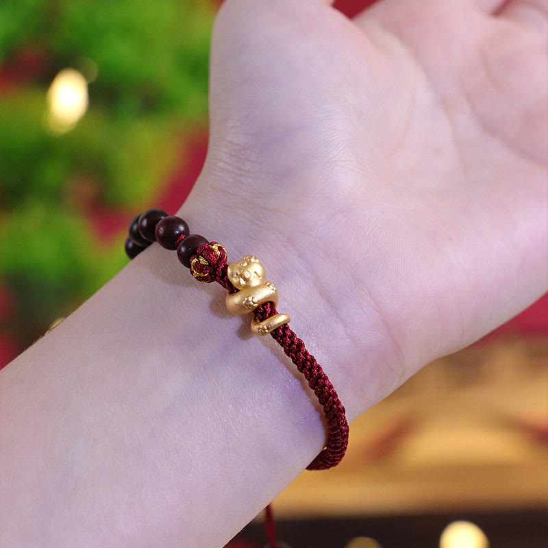 Pulsera trenzada de cuerda de algodón con cuentas de madera de ébano y sándalo rojo de hoja pequeña de Buda, año de la serpiente 999.