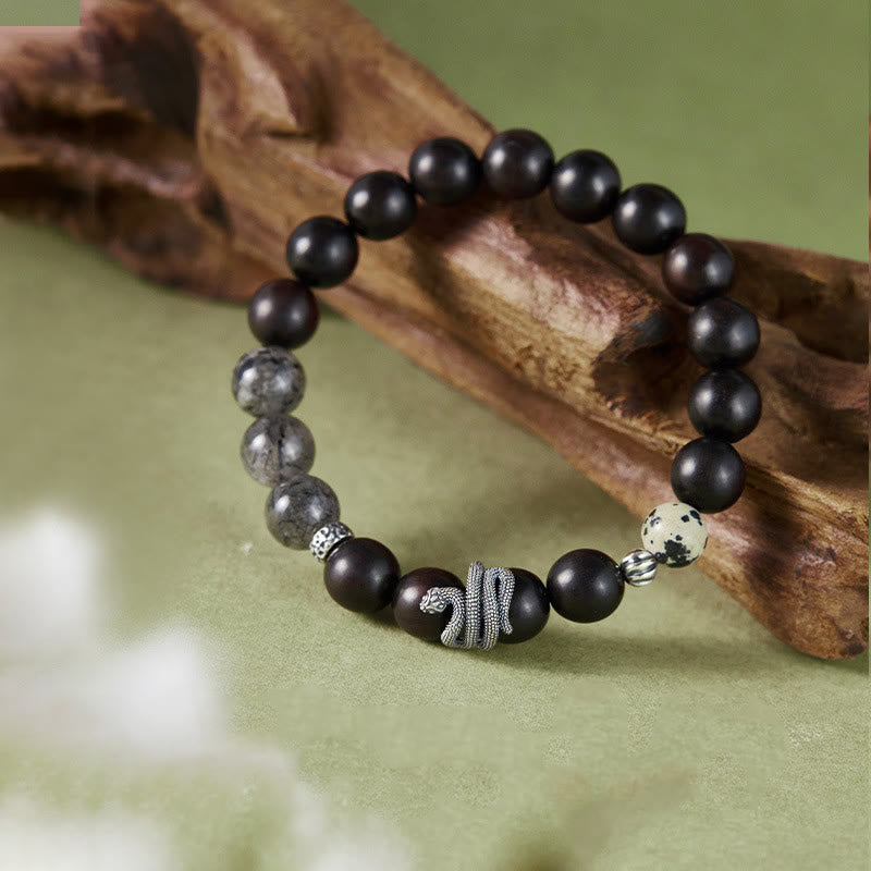 Pulsera de equilibrio del Año de la Serpiente con piedras de Buda, madera de ébano, cuarzo rutilado negro y plata de ley 925