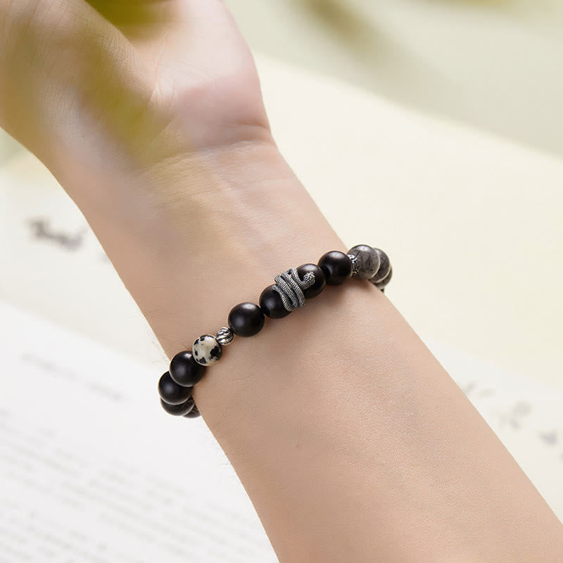 Pulsera de equilibrio del Año de la Serpiente con piedras de Buda, madera de ébano, cuarzo rutilado negro y plata de ley 925
