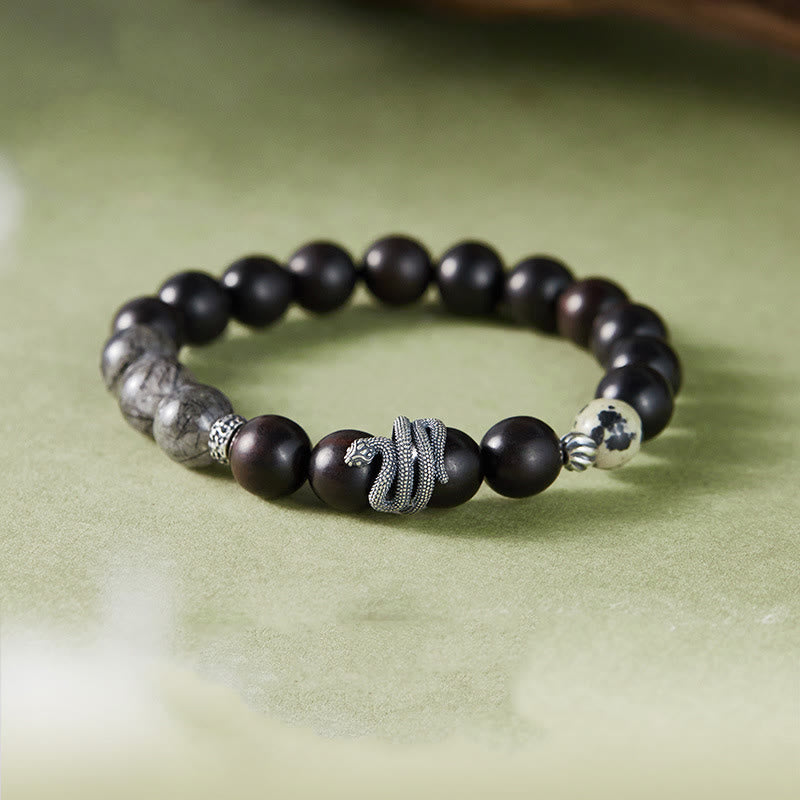 Pulsera de equilibrio del Año de la Serpiente con piedras de Buda, madera de ébano, cuarzo rutilado negro y plata de ley 925