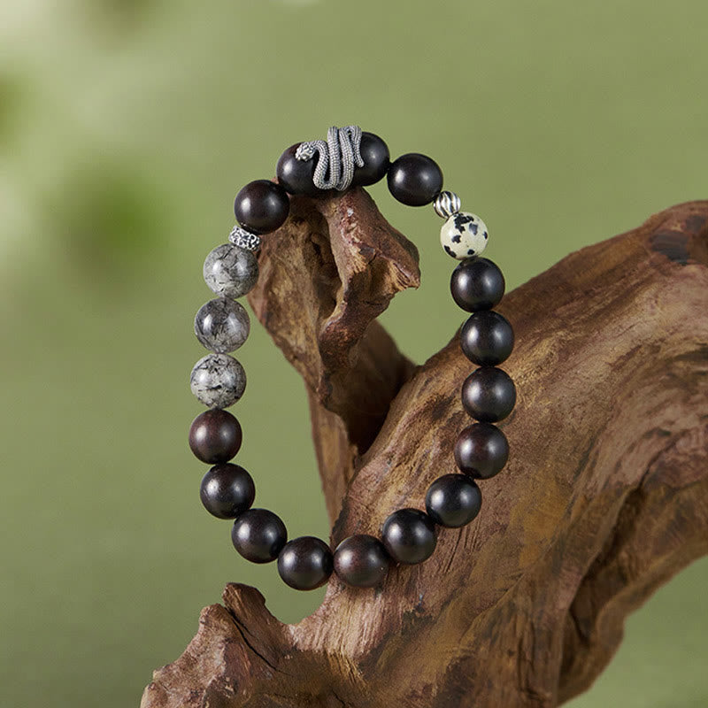 Pulsera de equilibrio del Año de la Serpiente con piedras de Buda, madera de ébano, cuarzo rutilado negro y plata de ley 925
