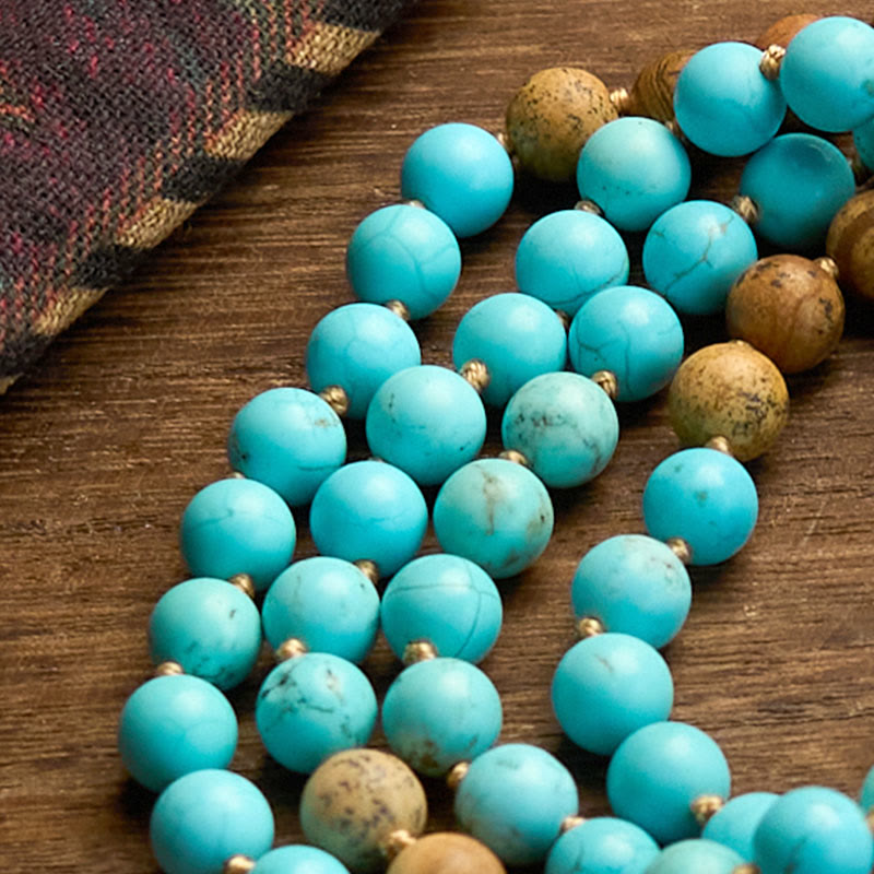 Pulsera de equilibrio con borlas de cuentas de jaspe turquesa y 108 cuentas de mala de Buda